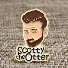Scotty the Otter pin badges